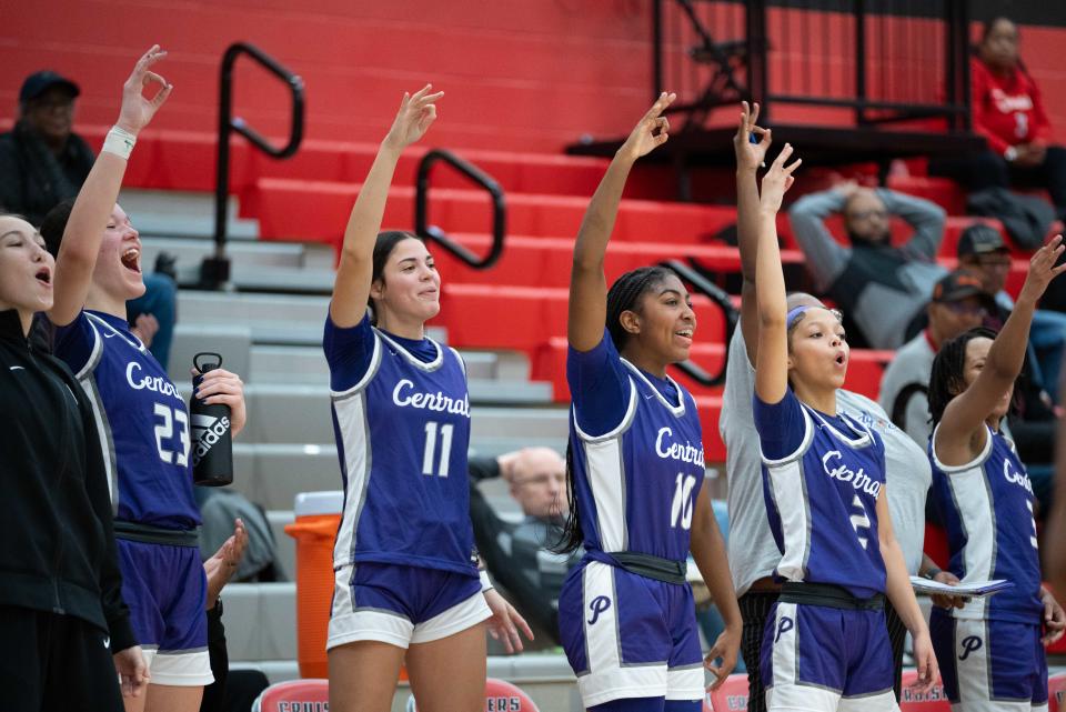 Pickerington Central celebrates a 3-pointer during Friday's win at Groveport.