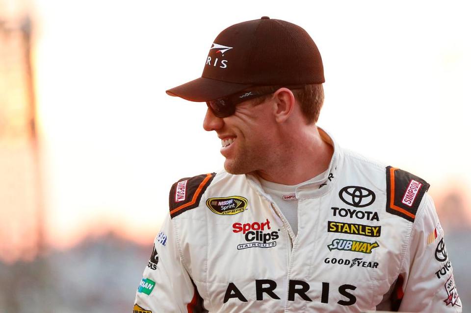 Sprint Cup Series driver Carl Edwards (19) smiles at fans during driver introductions prior to during the Federated Auto Parts 400 at Richmond International Raceway on Sept. 10, 2016.
