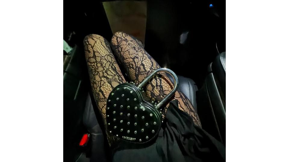 Her lace tights and LBD combo is the ultimate It-girl date night combo