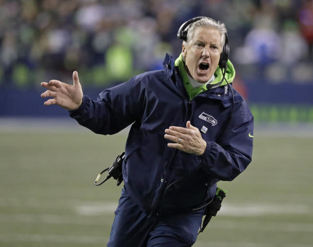 After clinching playoff spot, Seahawks give coach Pete Carroll an extension