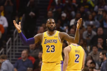 Dec 15, 2018; Charlotte, NC, USA; Los Angeles Lakers forward LeBron James (23) reacts after a play during the second half against the Charlotte Hornets at the Spectrum Center. Lakers won 128-100. Mandatory Credit: Sam Sharpe-USA TODAY Sports