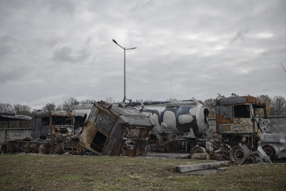 A view of a fuel depot hit by Russian missile in the town of Kalynivka, about 30 kilometers (18 miles) southwest of Kyiv, Ukraine, Thursday, Oct. 27, 2022. Environmental damage caused by Ukraine’s war is mounting in the 8-month-old conflict, and experts warn of long-term health consequences for the population. (AP Photo/Andrew Kravchenko)