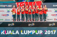 <p>Team Singapore performs during the synchronised swimming team free event on 20 Aug. Singapore won gold in the event, Malaysia took the silver and Indonesia bronze. Photo: Stanley Cheah/SportSG </p>