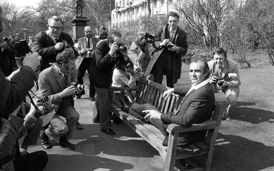 Connery, surrounded by photographers ahead of leaving London to shoot Diamonds Are Forever in Vegas - PA