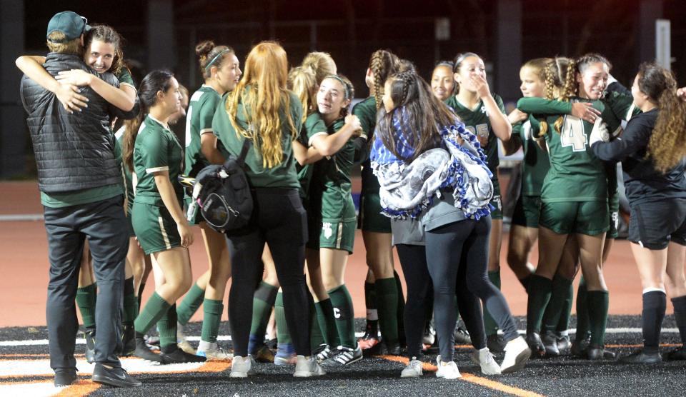 The St. Bonaventure High girls soccer team celebrates after winning the CIF-SS Division 6 title on May 28.