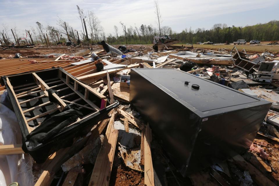 A gun vault and broken debris is all that is left of the home of Chad Mills along Hwy 15 on Saturday, April 1, 2023 in Pontotoc, Miss. Storms that dropped possibly dozens of tornadoes killed multiple people in small towns and big cities across the South and Midwest.