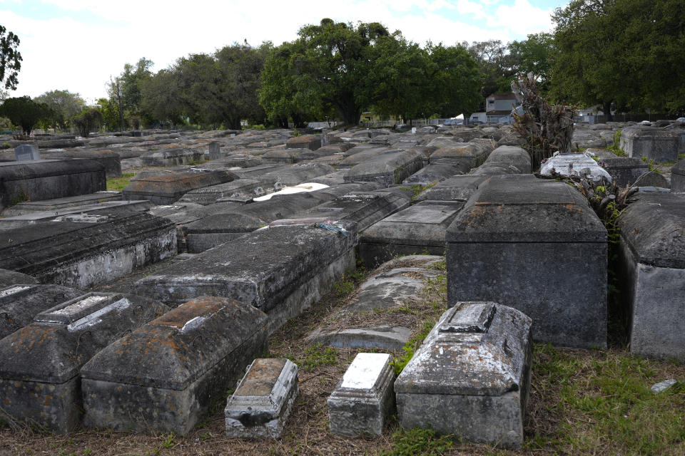 Rows of tightly placed crypts, including those of children and infants, cover 20 acres at the Lincoln Memorial Park Cemetery, Monday, Feb. 26, 2024, in the Brownsville neighborhood of Miami. The segregated cemetery had suffered from years of neglect and vandalism. (AP Photo/Marta Lavandier)