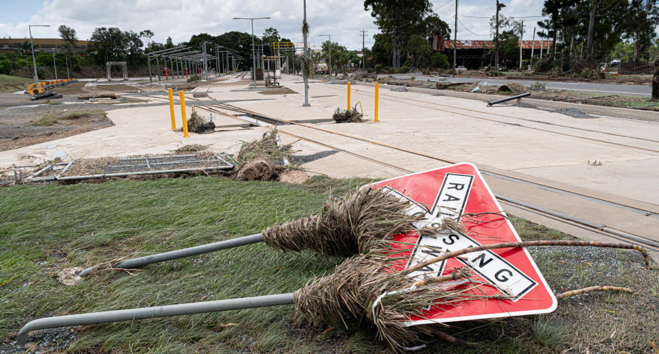 A sign blown over. 