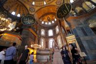 People visit Hagia Sophia or Ayasofya Museum in Istanbul