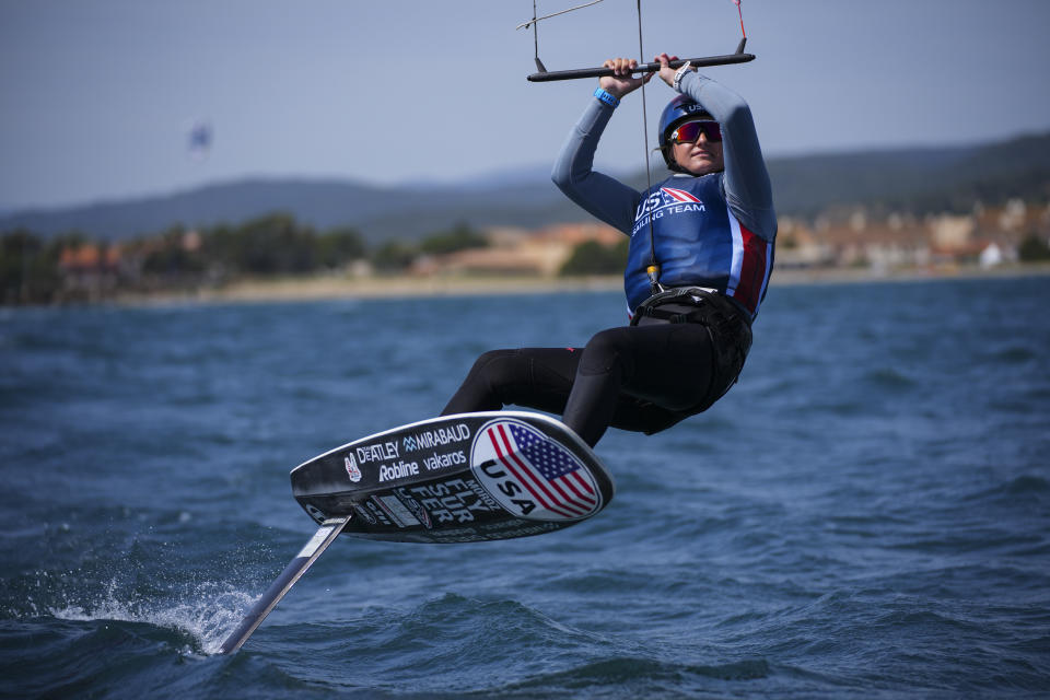 FILE - U.S. Olympic sailing team member Daniela Moroz kiteboards during a training session in Hyeres, southern France, Monday, April 29, 2024. The fastest sport at the Paris Games has such wild speeds that the athletes say the waves and the wind become muted. (AP Photo/Daniel Cole, File)