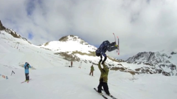 Skier performs the ultimate high five- video