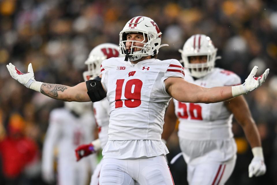 Wisconsin Badgers linebacker Nick Herbig reacts after a sack against the Iowa Hawkeyes during the second quarter at Kinnick Stadium on Nov. 12.