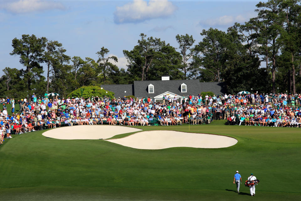 AUGUSTA, GA – APRIL 11: Jordan Spieth of the United States walks with his caddy Michael Greller on the ninth hole during the third round of the 2015 Masters Tournament at Augusta National Golf Club on April 11, 2015 in Augusta, Georgia.  (Photo by Jamie Squire/Getty Images)