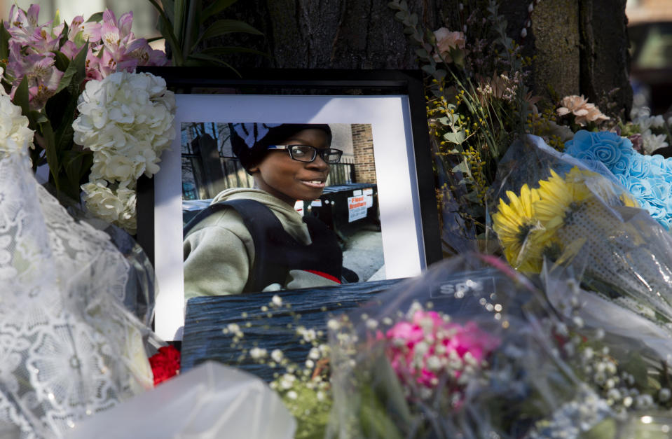 A photo of Jayden Perkins, a 11-year-old boy who was stabbed to death in his home on March 13, at a memorial on March 15, 2024, outside Perkin's home in Chicago. The Illinois Senate’s minority leader castigated Gov. J.B. Pritzker on Tuesday, April 2, 2024 after the Democrat’s Prisoner Review Board released a convicted domestic abuser who, a day later, attacked a pregnant Chicago woman with a knife and fatally stabbed her 11-year-old son when he tried to protect her. (Vincent Alban/Chicago Tribune via AP)/Chicago Tribune via AP)