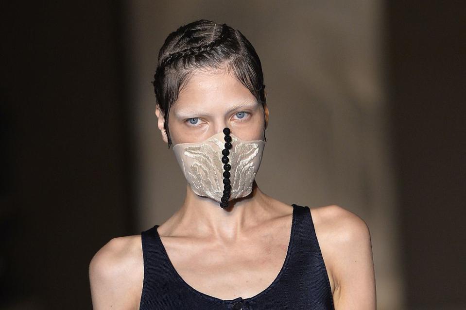 Face masks have been making an appearance on the catwalk [Photo: Getty]