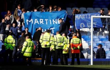 Britain Football Soccer - Everton v AFC Bournemouth - Barclays Premier League - Goodison Park - 30/4/16 Everton fans with a banner regarding Everton manager Roberto Martinez Reuters / Phil Noble Livepic