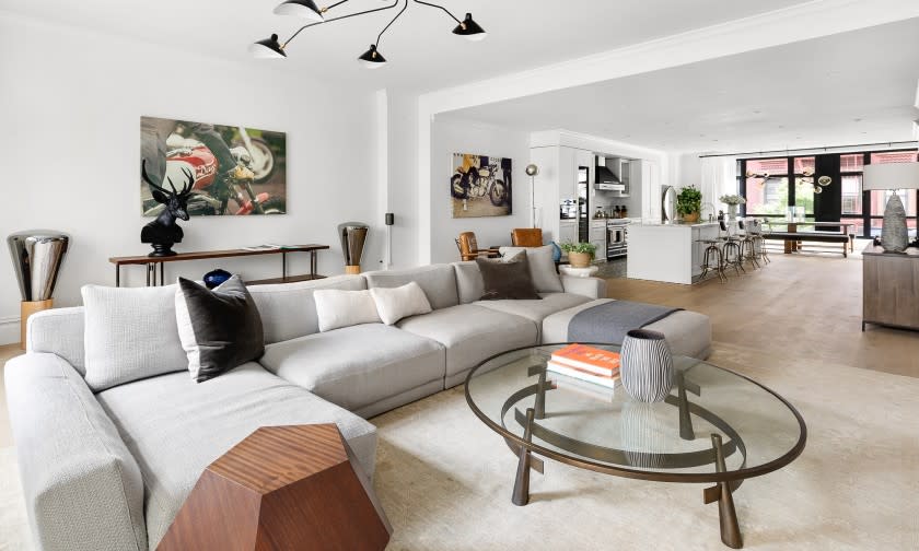 The full-floor condo in Lower Manhattan includes three bedrooms, three bathrooms and a 1,450-square-foot private terrace.