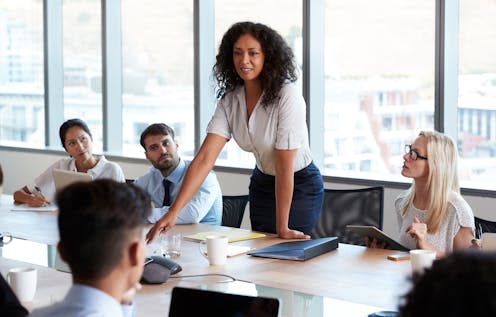 <span class="caption">Investing in the people around you can help you get to the top and stay there.</span> <span class="attribution"><a class="link " href="https://www.shutterstock.com/image-photo/businesswoman-stands-address-meeting-around-board-633424550" rel="nofollow noopener" target="_blank" data-ylk="slk:Monkey Business Images/Shutterstock;elm:context_link;itc:0;sec:content-canvas">Monkey Business Images/Shutterstock</a></span>