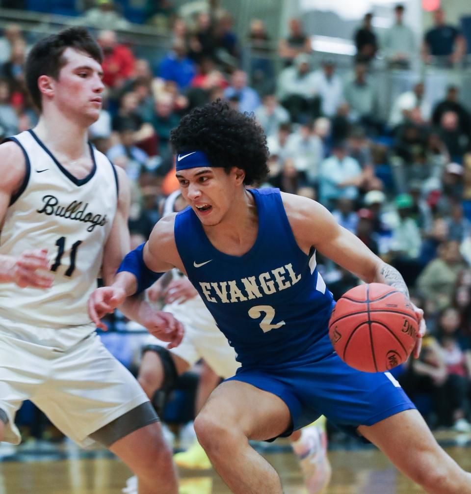 Evangel's Christian Doerr drives against Fairdale's Dalton Hicks during the Sixth Region championship Tuesday at Valley High School.