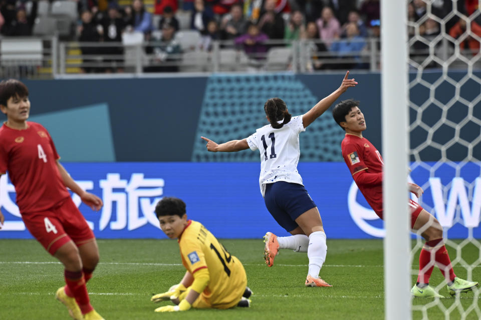 United States' Sophia Smith celebrates after scoring the opening goal during the Women's World Cup Group E soccer match between the United States and Vietnam at Eden Park in Auckland, New Zealand, Saturday, July 22, 2023. (AP Photo/Andrew Cornaga)