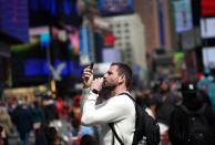 TikTok users in Times Square in New York City