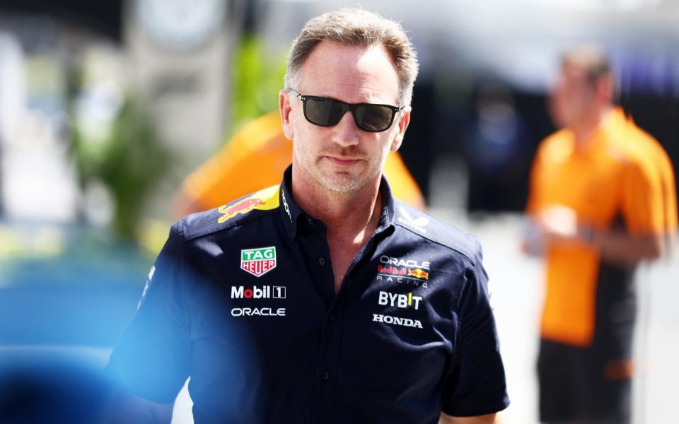 Christian Horner walks in the paddock