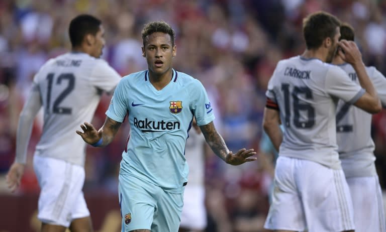 Barcelona's Neymar celebrates after scoring a goal during their International Champions Cup (ICC) friendly match against Manchester United, at the FedExField in Landover, Maryland, on July 26, 2017