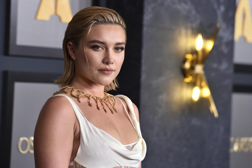 Florence Pugh arrives at the Governors Awards on Saturday, Nov. 19, 2022, at Fairmont Century Plaza in Los Angeles. (Photo by Jordan Strauss/Invision/AP)