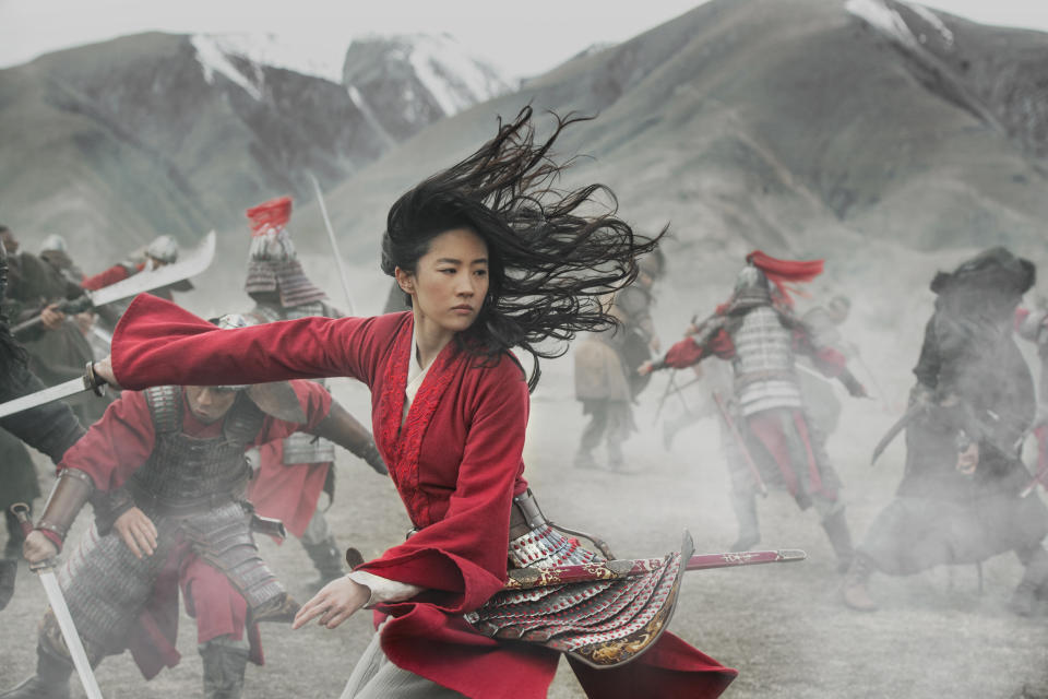 This image released by Disney shows Yifei Liu in the title role of "Mulan." Last month, Walt Disney Co. experimented with the $200 million "Mulan" as a $30 premium buy on its fast-growing streaming service, Disney+. This Friday it will be free for all Disney+ subscribers. (Jasin Boland/Disney via AP)