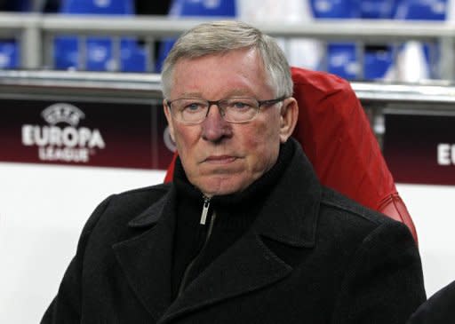 Manchester United manager Sir Alex Ferguson, pictured here on February 16, fears an Everton backlash following the Merseyside club's heartbreaking FA Cup semi-final loss to Liverpool last weekend