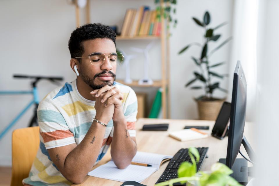 Man working at desk.