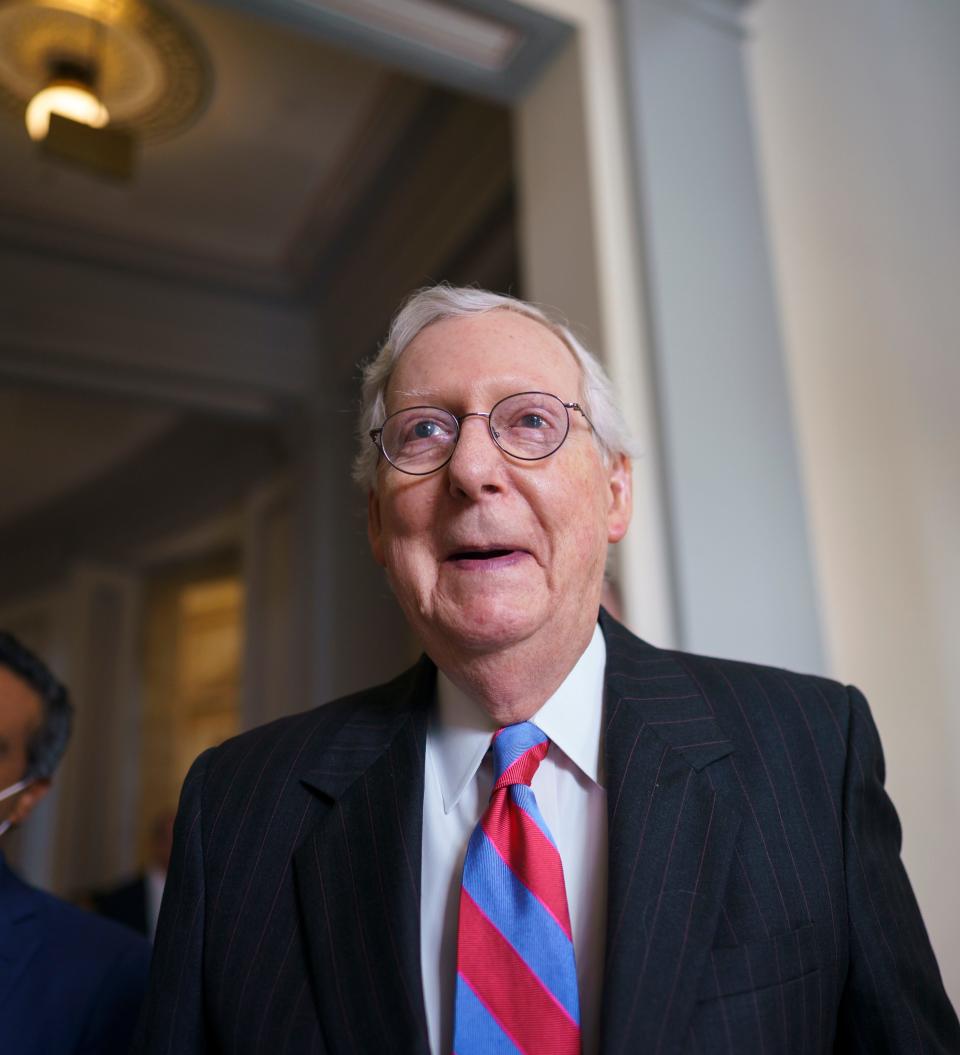 Senate Minority Leader Mitch McConnell, R-Ky., returns to the Senate chamber for a vote after attending a bipartisan barbecue luncheon, at the Capitol in Washington on Sept. 23, 2021.