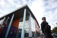 British police officer shot dead at custody centre in south London