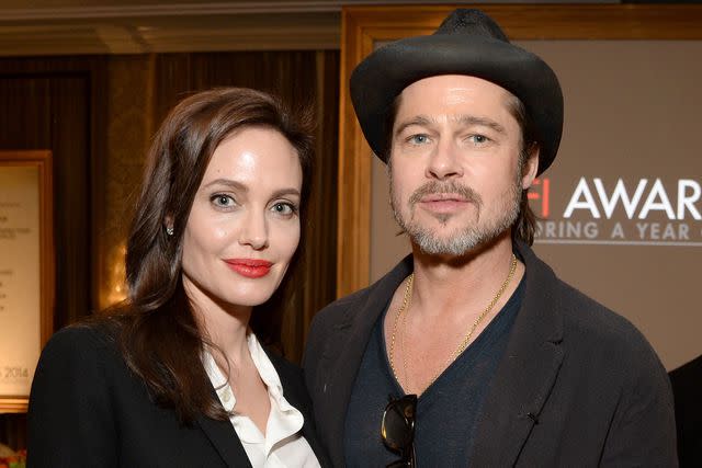 <p>Michael Kovac/Getty</p> Angelina Jolie and Brad Pitt