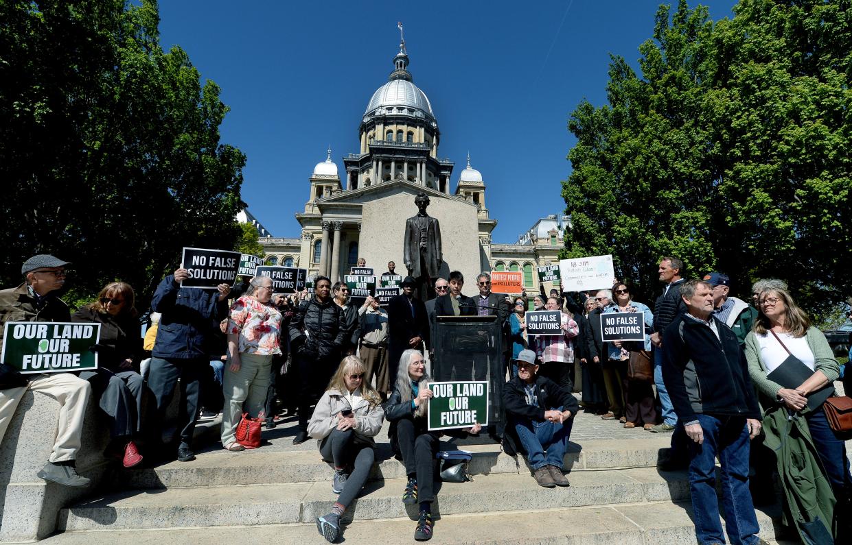 Christine Nannicelli of the Sierra Club Illinois, center, speaks during a press conference against carbon dioxide pipelines in front of  the state Capitol Tuesday, May 2, 2023.