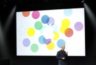 Apple Inc CEO Tim Cook speaks during Apple Inc's media event in Cupertino, California September 10, 2013. (REUTERS/Stephen Lam)