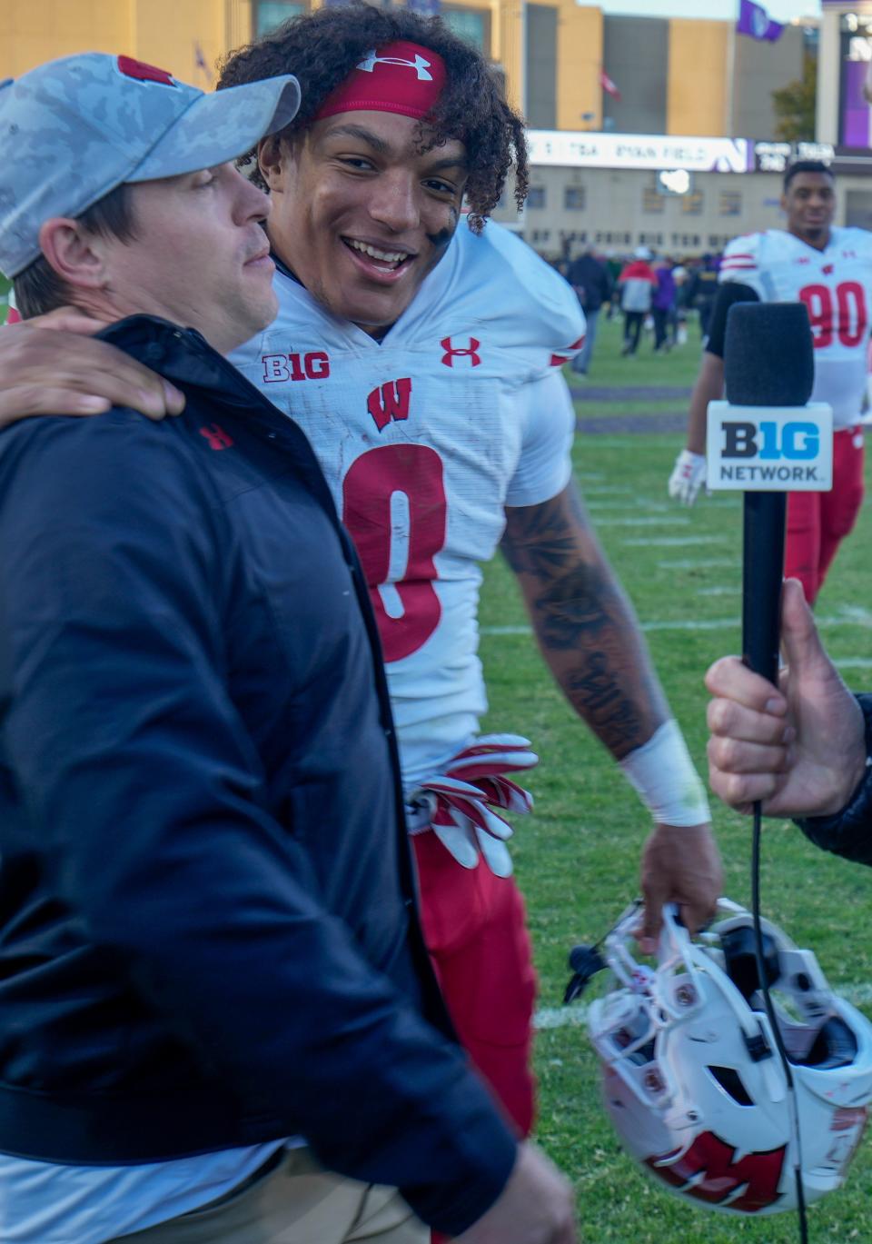 Jim Leonhard and Braelon Allen after an Oct. 8 game.