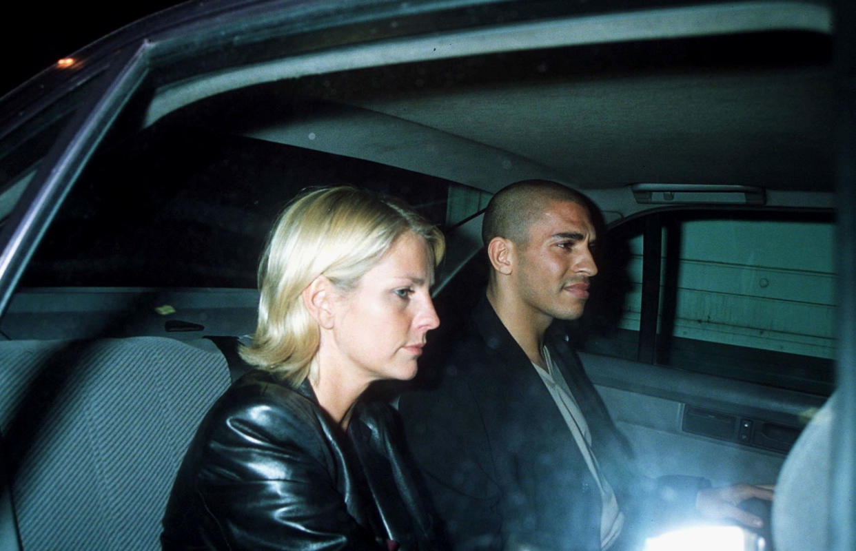 LONDON - 1998:  Ulrika Johnson and footballer Stan Collymore leave Cobdens Club in London. (Photo by Dave M. Benett/Getty Images)