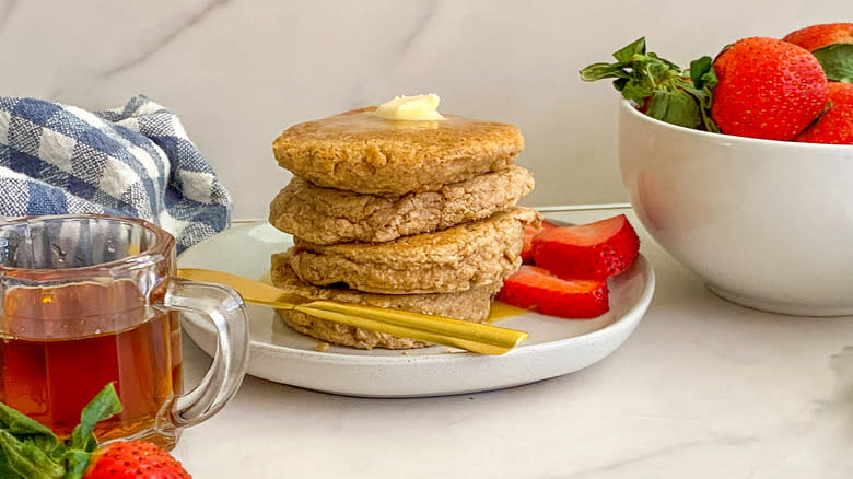 Stack of pancakes with strawberries