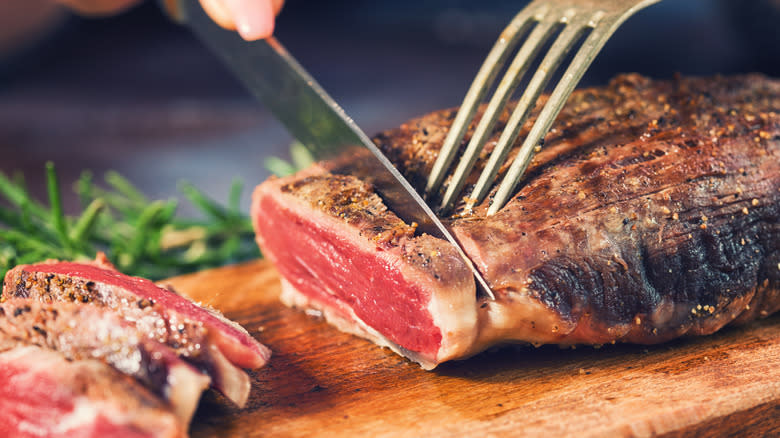 beef tenderloin served on cutting board