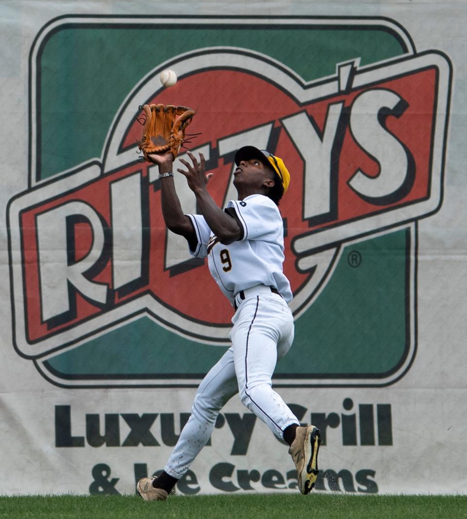 Central's Jaiden Clark (9) hauls in a long fly ball during their sectional game against Castle at Bosse Field Friday evening, May 27, 2022.