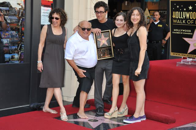 <p> Frank Trapper/Corbis via Getty</p> Danny DeVito and Rhea Perlman with their kids