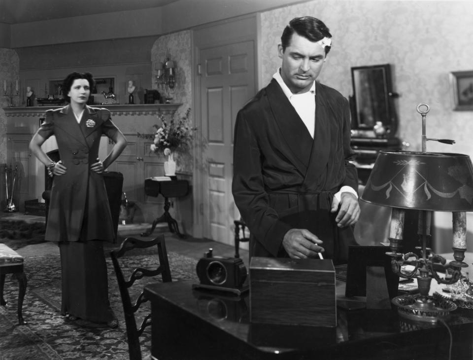 1939:  Cary Grant (1904 - 1986) as Alec Walker and Kay Francis as his wife Maida Walker in a scene from the RKO film 'In Name Only'.  (Photo by Hulton Archive/Getty Images)