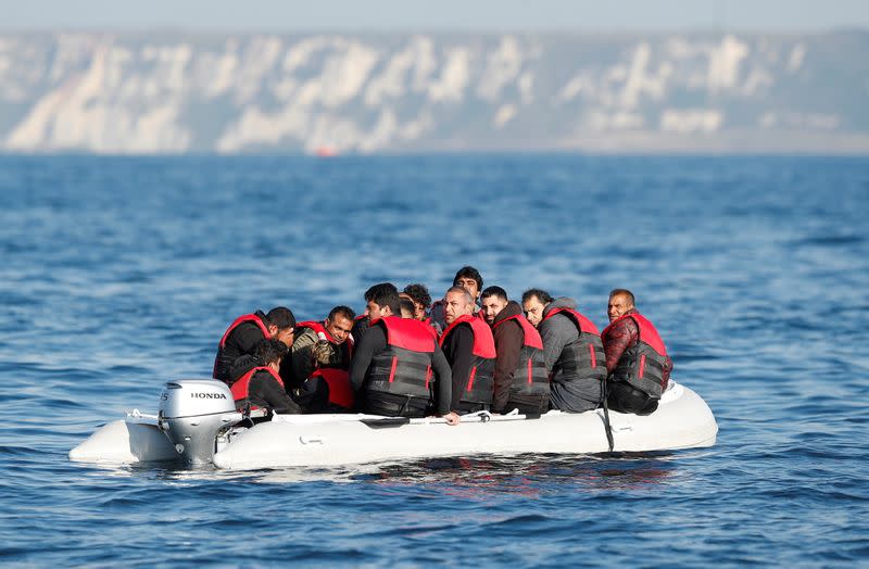 Migrants who launched from the coast of northern France cross the English Channel in an inflatable boat near Dover