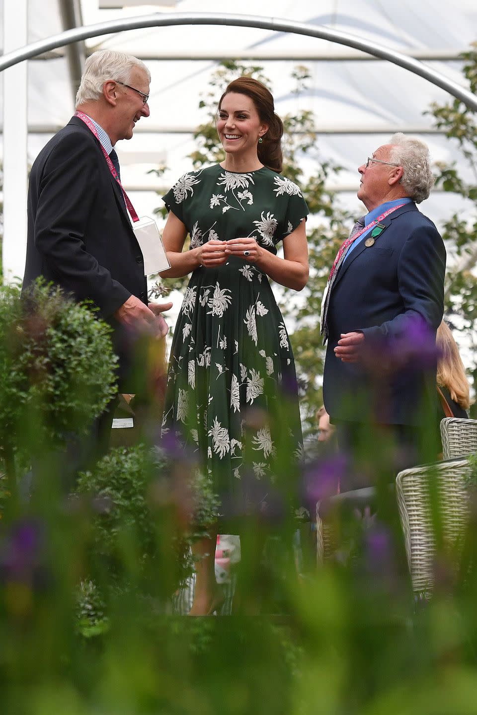 <p>Middleton sports a green floral silk dress by Rochas with nude pumps while visiting the annual Chelsea Flower Show in London.</p>