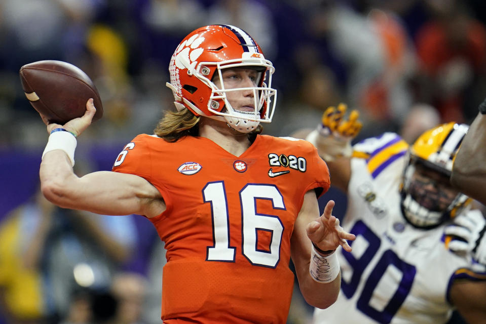 FILE - In this Jan. 13, 2020, file photo, Clemson quarterback Trevor Lawrence throws a pass against LSU during the first half of a NCAA College Football Playoff national championship game in New Orleans. The college quarterbacks class is shaping up nicely, just in time to perhaps rescue some NFL teams from themselves. (AP Photo/David J. Phillip, File)