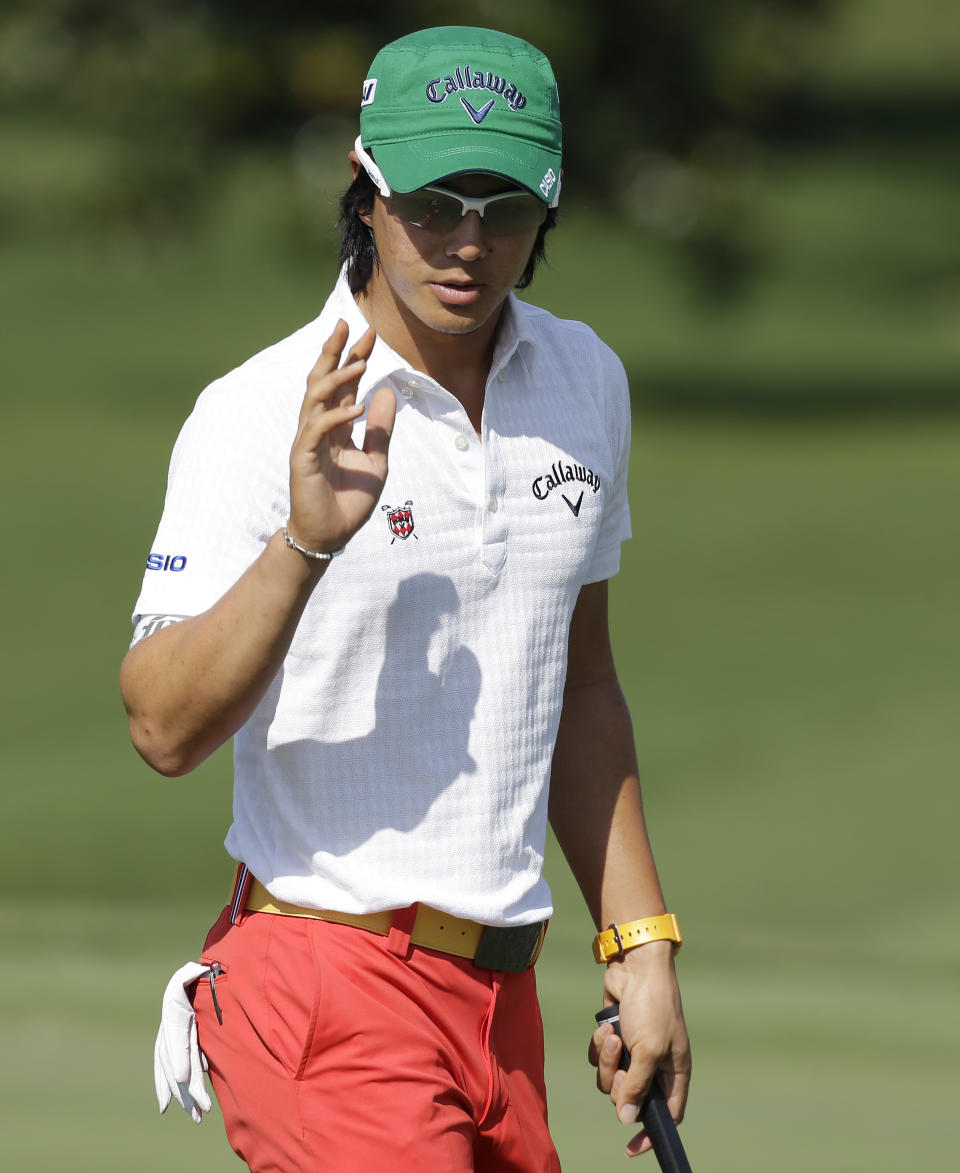 Ryo Ishikawa, of Japan, waves to the gallery after making a birdie putt on the 16th hole during the first round of the Arnold Palmer Invitational golf tournament at Bay Hill Thursday, March 20, 2014, in Orlando, Fla. (AP Photo/Chris O'Meara)