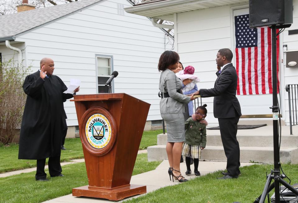 Milwaukee County Judge Joe Donald swore in the new County Executive, David Crowley in front of Crowley’s home  in Milwaukee.