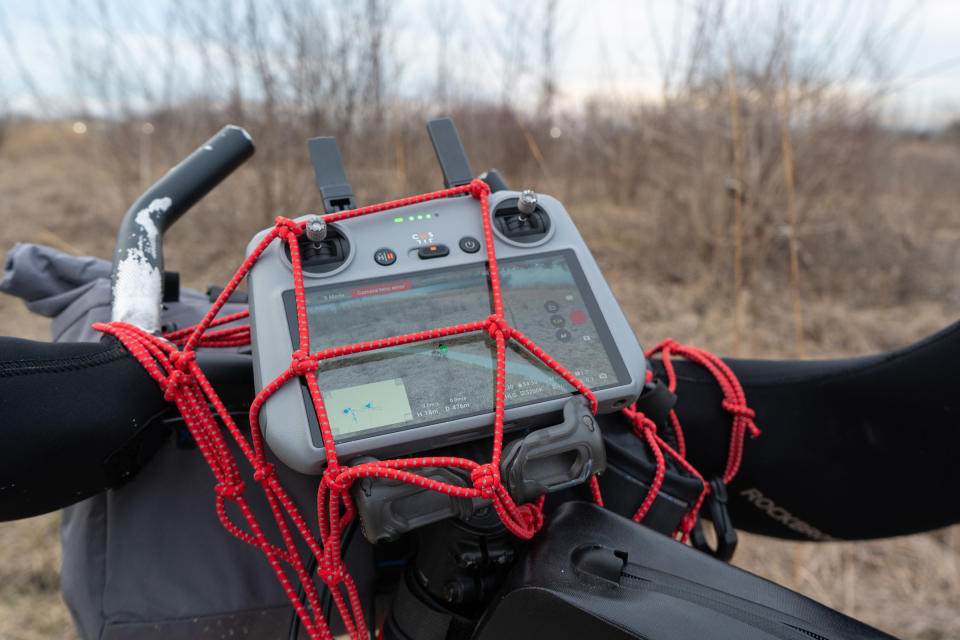 drone controller in use during bikepacking