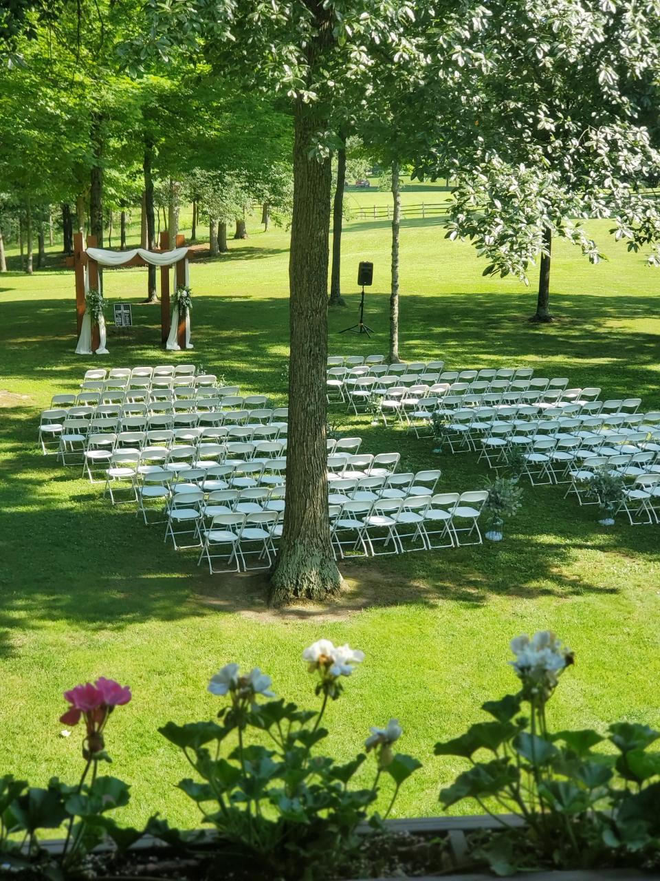 An outdoor wedding ceremony is ready to happen on the grounds of The Bauerhaus in Darmstadt.